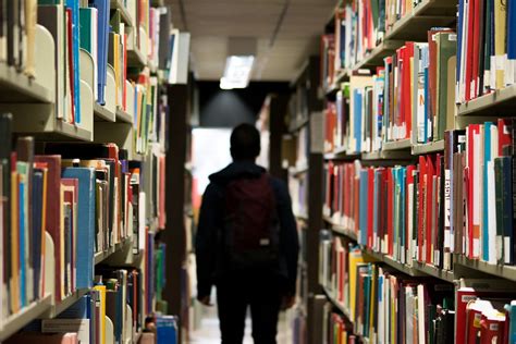 library books shelves  photo  pixabay