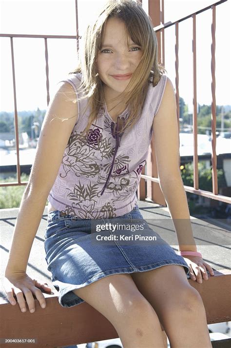 teenage girl sitting  steps smiling portrait high res stock photo