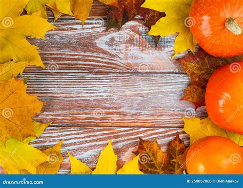 Festive Autumn Composition with Autumn Leaves and Pumpkins on a Wooden ...