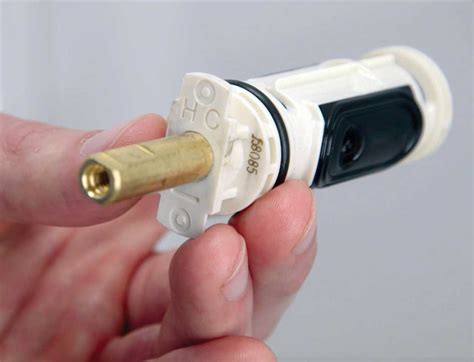 how to change moen shower cartridge