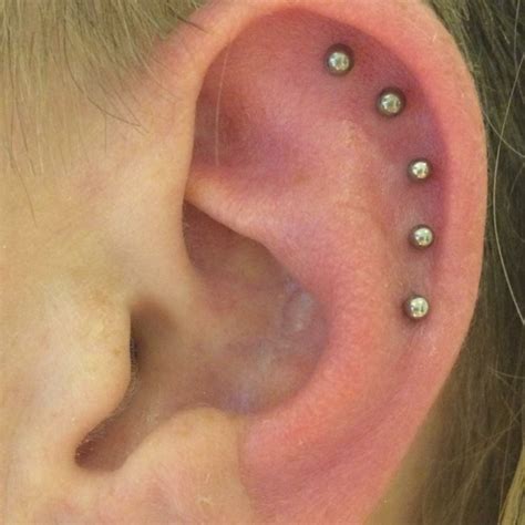 Helix Piercing [50 Ideas]: Pain Level, Healing Time, Cost, Experience ...