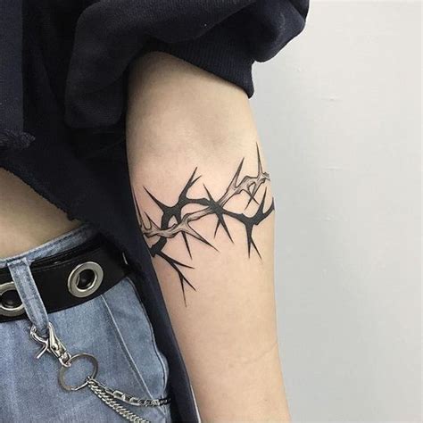 10 Mind-blowing crown of thorns tattoos