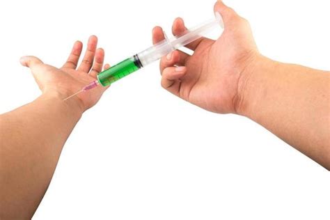 Injection Hand Stock Photos, Images and Backgrounds for Free Download