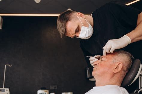 Premium Photo | Old man visiting male doctor for plastic surgery