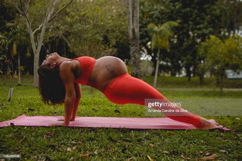 Pregnant Black Woman Doing Yoga Outdoors High-Res Stock Photo - Getty