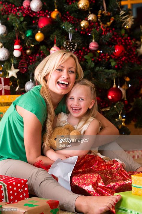 Family On Christmas Day High-Res Stock Photo - Getty Images