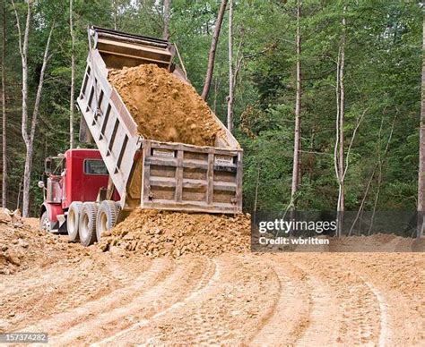 dump truck dumping stock  high res pictures  images
