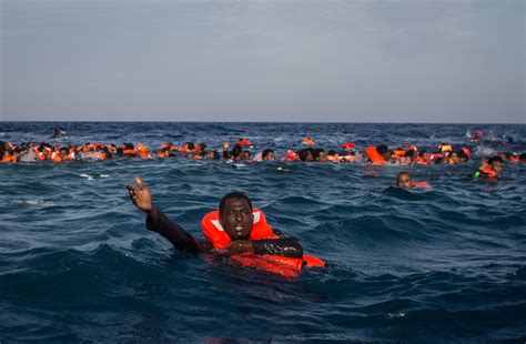 Migrant boat capsizes in Mediterranean off Libya, more than 30, mostly