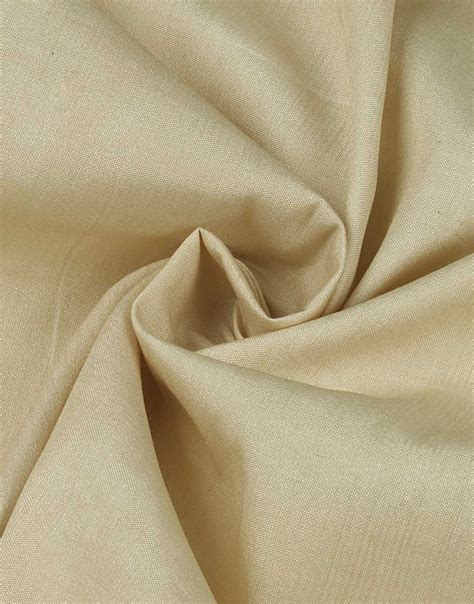 Cream color Poly Cotton fabric for Ladies Suit - Charu Creation