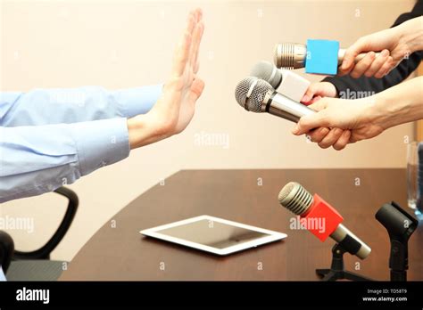 conceptual photo  businessman  politician giving  comments stock