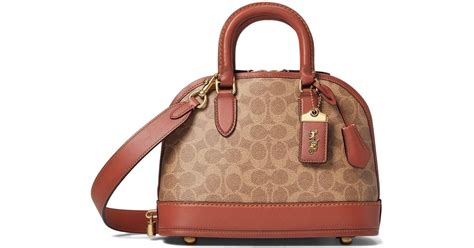 coach coated canvas signature revel bag  brown lyst