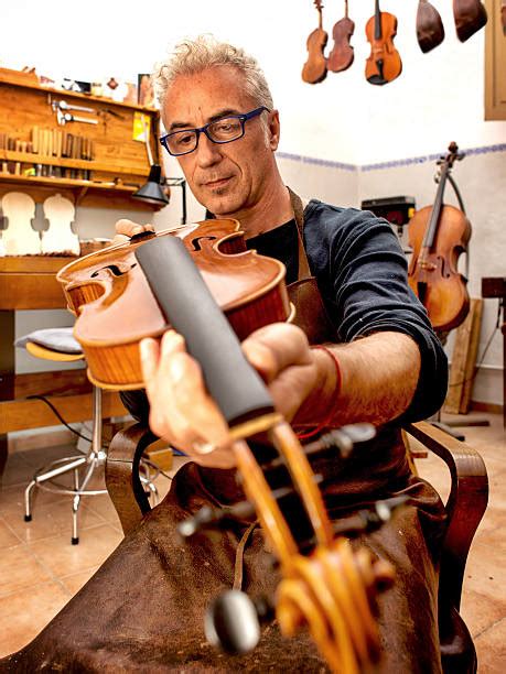 violin maker  work  cremona italy stock  pictures