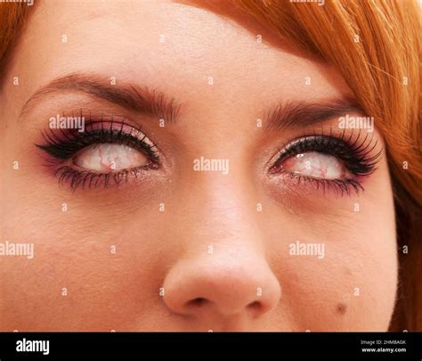 Young girl with zombie eyes Stock Photo - Alamy