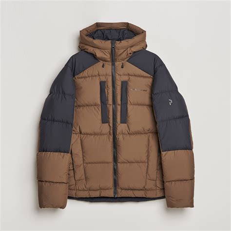 Peak Performance Rivel Down Seasonal Hooded Jacket Woody Black osoitteesta
