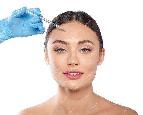 Premium Photo | Portrait of an attractive young woman receiving botox