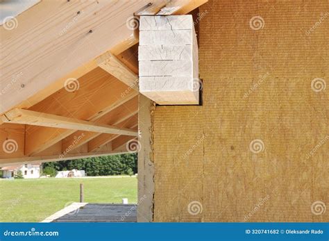 close   house roof eaves  wooden fascia rake  construction