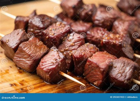 Detail View of Garlic Bbq Steak Tips Texture on a Wooden Skewer Stock ...