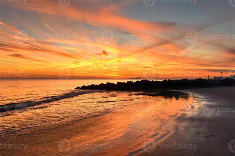 Coney Island Beach at Sunset. 16111015 Stock Photo at Vecteezy