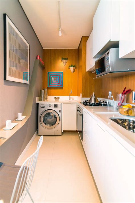 Area De Serviço E Cozinha - Cozinha e Área de Serviço Integradas | OMA - Casa de Valentina