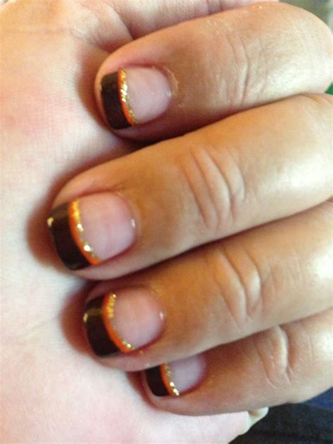 Fall nails -- brown tips lined w/ orange and glitter #fingernails #