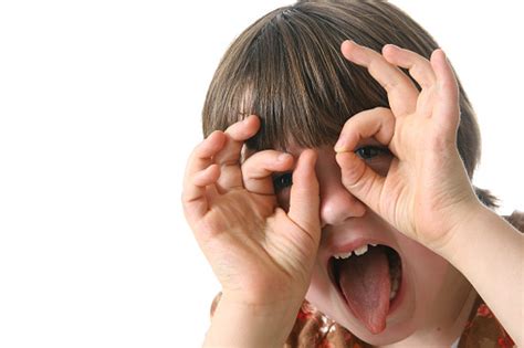 Child Making Funny Silly Faces Stock Photo - Download Image Now - iStock