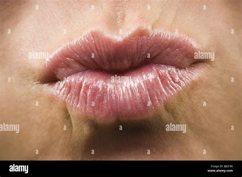 woman biting lip lips  res stock photography  images alamy