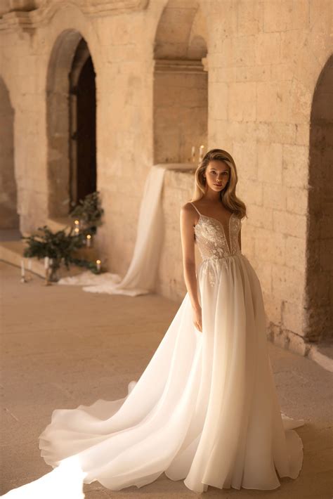 A-Line Lace Tulle Wedding Dress with Spaghetti Strap Delicate Deep V