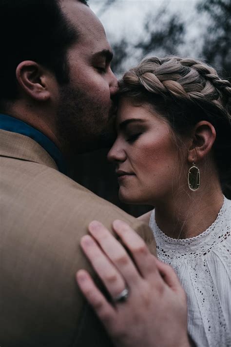 adult affection braided hair couple embrace facial expression