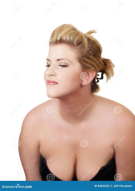 Young Woman with Low Cut Dress Showing Cleavage Stock Photo - Image of