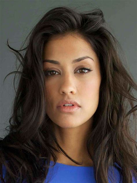 Download Janina Gavankar exuding elegance in a captivating pose