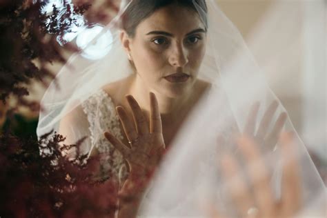 A Bride Raising her Veil · Free Stock Photo