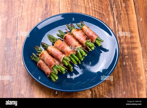 Bacon asparagus roll Stock Photo - Alamy