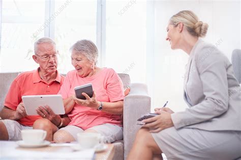 Financial advisor consulting seniors - Stock Image - F016/0386 ...