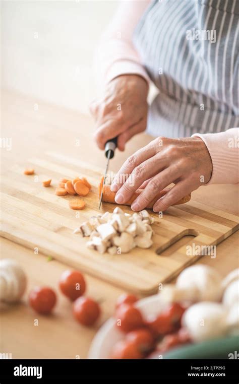 hands woman cutting  mushrooms  res stock photography  images