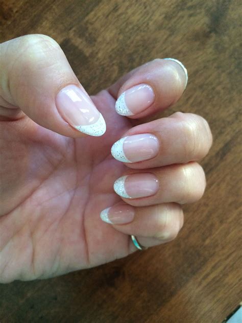 Super fun almond shaped nails with just a touch of glitter bling