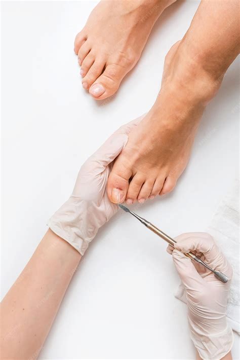Premium Photo | Pedicure podologist patient on medical pedicure