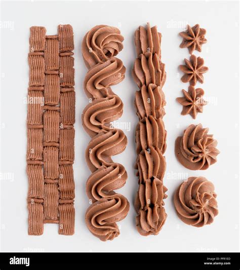 piped chocolate icing designs close  stock photo alamy