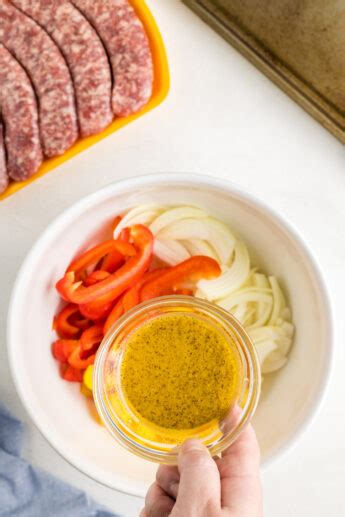 Oven Roasted Bratwurst with Peppers and Onions - Recipe by Blackberry Babe