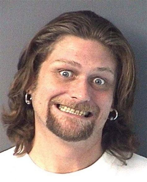 people smiling in mugshots 4
