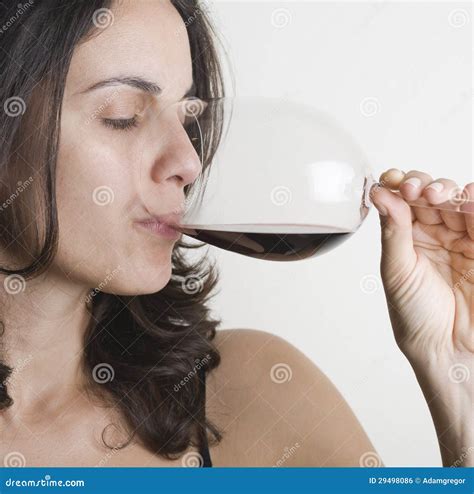 Woman drinking red wine stock photo. Image of alcohol - 29498086