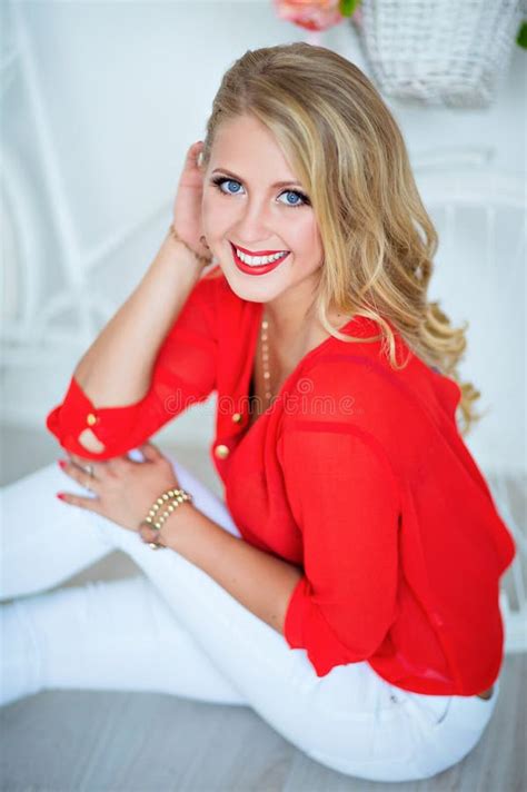 Very Girl Smiling with Perfect Make-up in the Red Shirt Stock Image