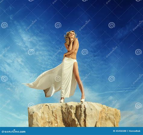 Half-naked Blonde Posing on the Top of the Mountain Stock Photo - Image