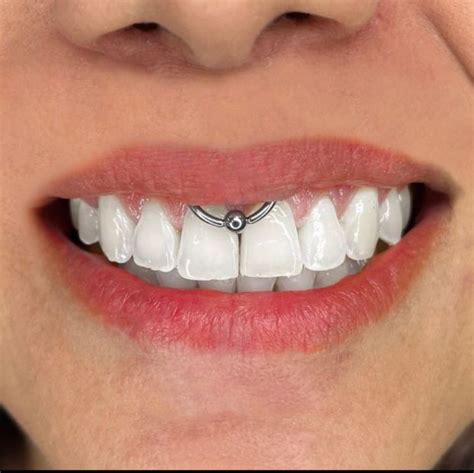 curious   smiley piercing read