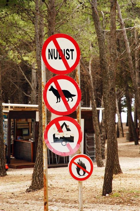 signs prohibiting nudists dogs tents  campfires stock image
