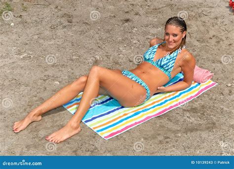 Woman Bikini Beach Sunbathing Stock Image - Image of sand, beach: 10139243
