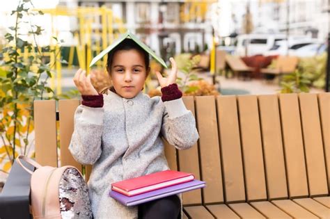 Premium Photo | Beautiful young elementary school girl autumn.