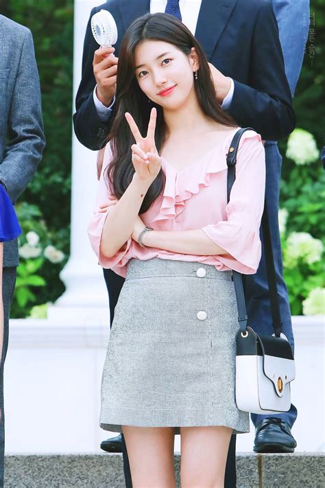 Download Cute Bae Suzy Peace Sign Wallpaper | Wallpapers.com