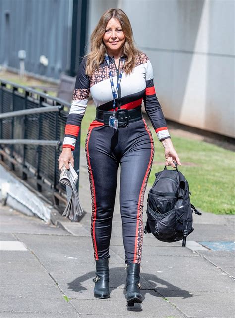 Carol Vorderman in Tight Fendi-Printed Top and Matching Skintight