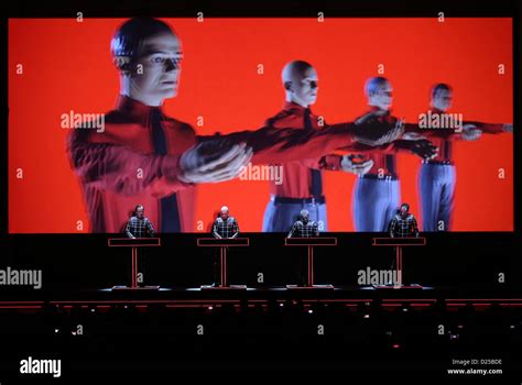 The members of the German electronic band Kraftwerk perform on stage at ...