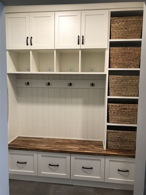 Organized Mudroom with Charging Stations and Butcher Block Bench